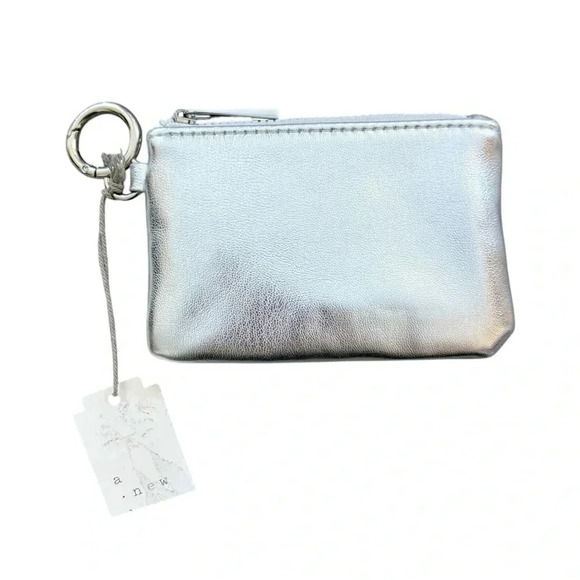 a new day Handbags - NWT Metallic Silver Coin Pouch